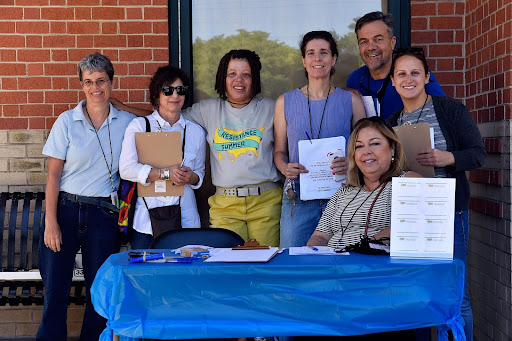 July 2017, Rockville, MD – MoveOn.org volunteers and Lauriann Duarte, Resistance Summer mobilizer (3rd from left) before taking health care concerns to the streets to hear local residents voice their opinions during MoveOn's Neighborhood Listening Project. Voters are ensuring accountability for those who voted to repeal the Affordable Care Act, guarding against future Trump administration sabotage of the ACA, and working to promote Medicare for All. (Photo by Larry French/Getty Images for MoveOn.org) 824511190